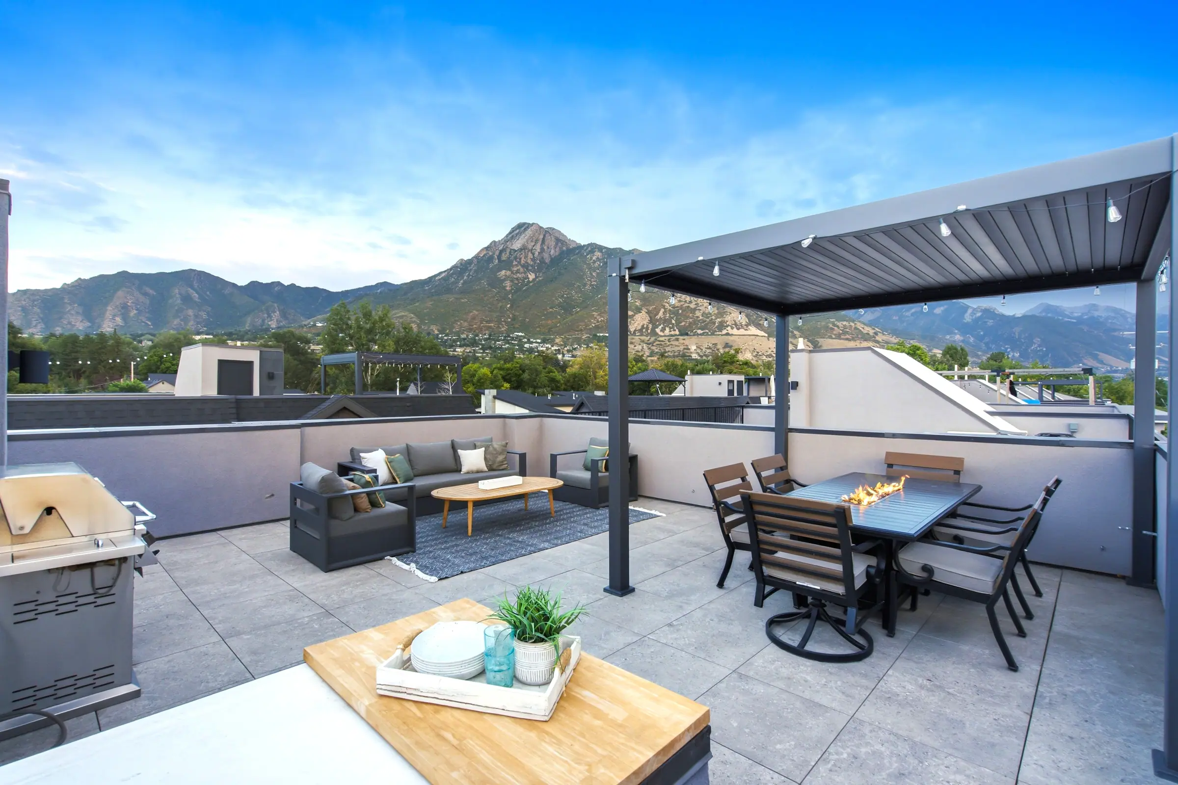 Rooftop deck at dusk facing Mount Olympus